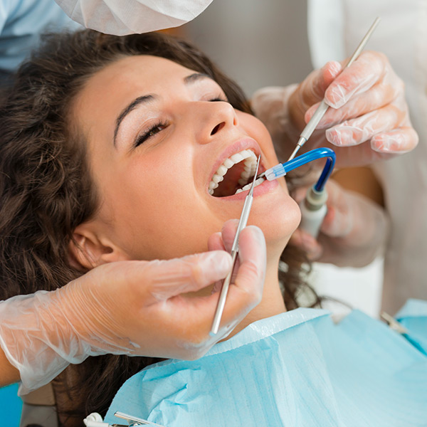 A women getting teeth treatment