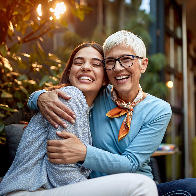 Happy mother and daughter enjoying the day outdoors