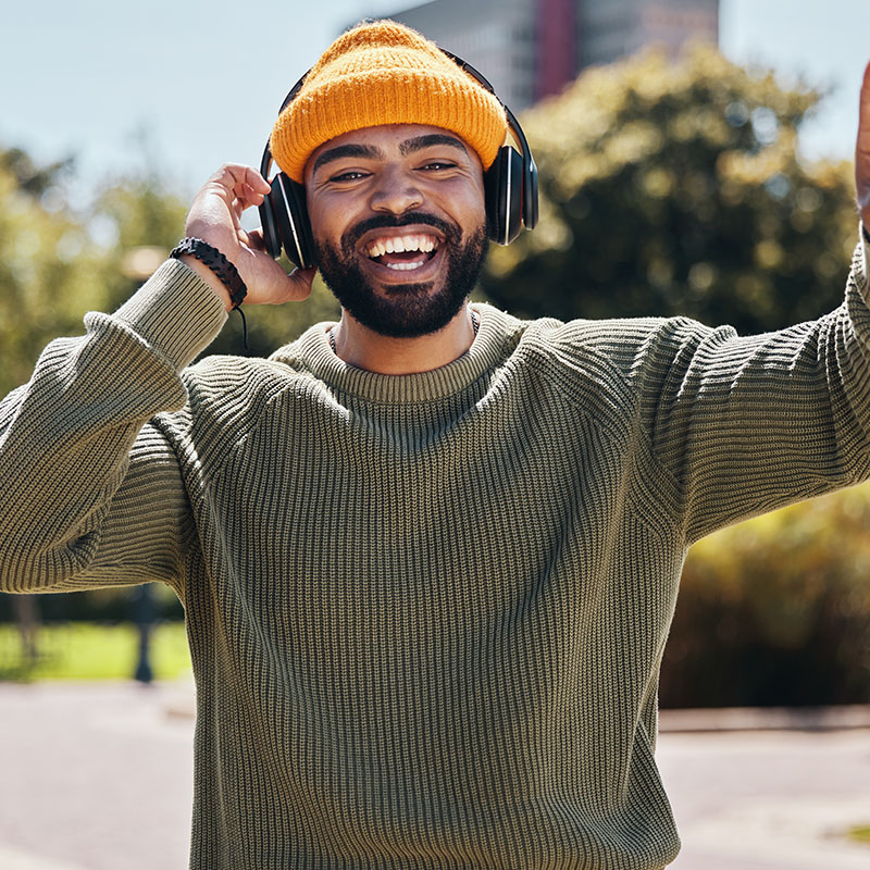 Man wearing earphones and having fun