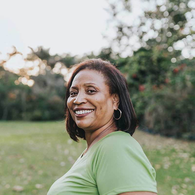 Happy woman smiling outdoors