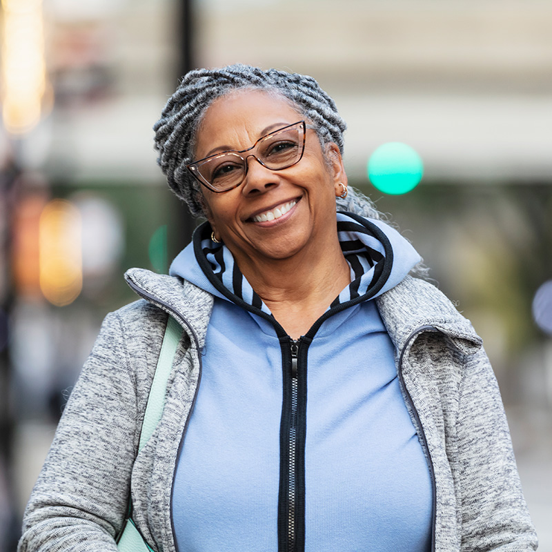 Woman smiling ooutdoors