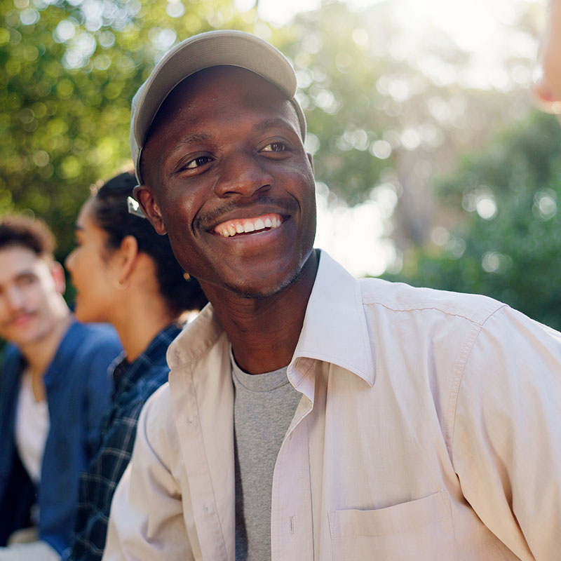 Happy man smiling outdoors